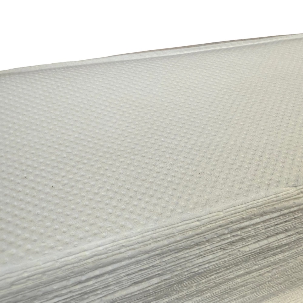 Zwei Lagen weißes Handtuchpapier in einem Stapel mit V-Falz und strukturierter Oberfläche.